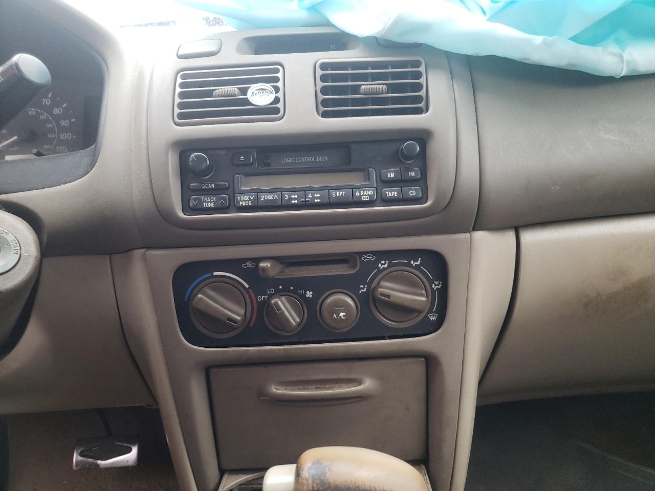 Photo 9 from auction – 1999 TOYOTA COROLLA VE with VIN 2T1BR12E7XC115837