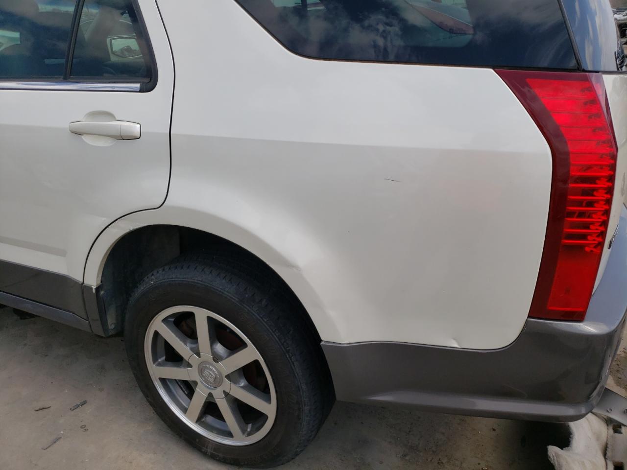 Photo 9 from auction – 2004 CADILLAC SRX with VIN 1GYEE63A140166056