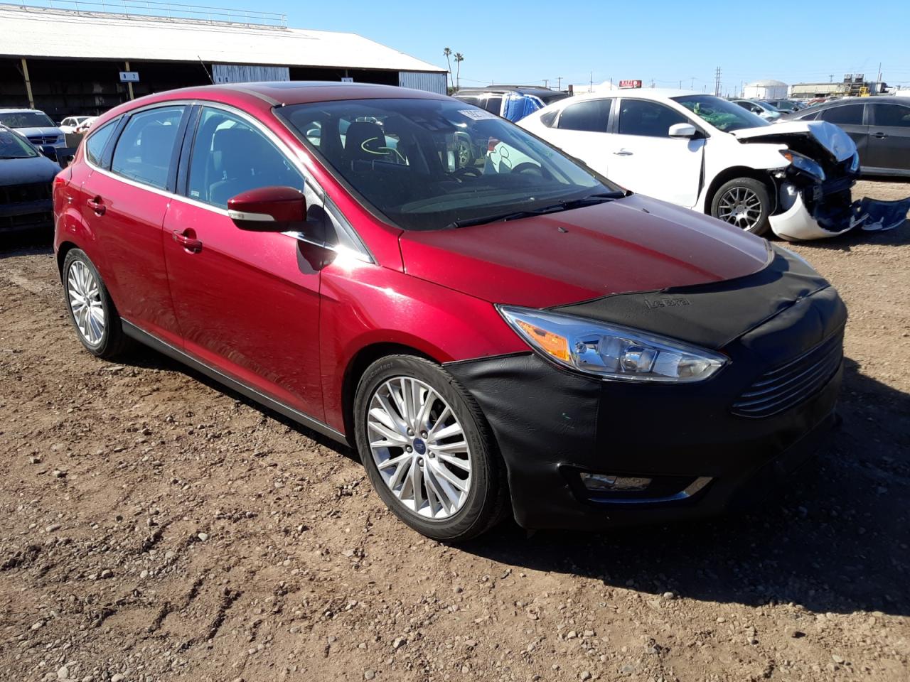 FORD FOCUS TITA 2015 with VIN 1FADP3N22FL300869 - Photo from auction