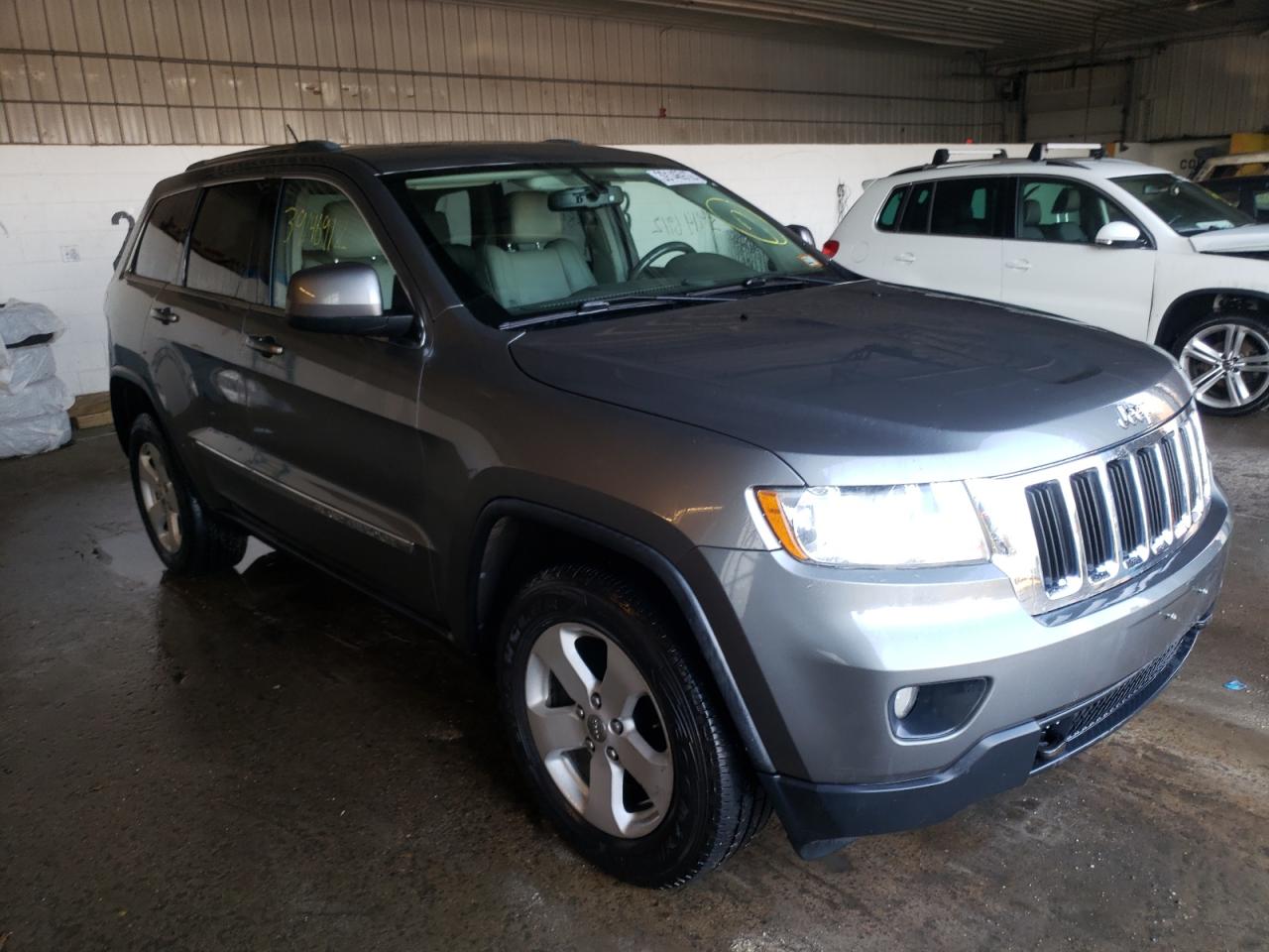 JEEP GRAND CHER 2011 with VIN 1J4RR4GG0BC577016 - Photo from auction