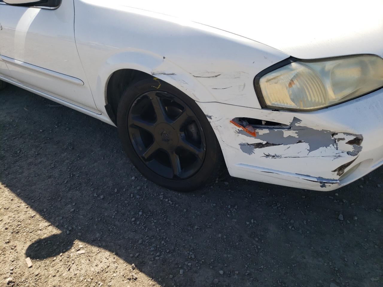 Photo 9 from auction – 2000 NISSAN MAXIMA GLE with VIN JN1CA31D2YT533381