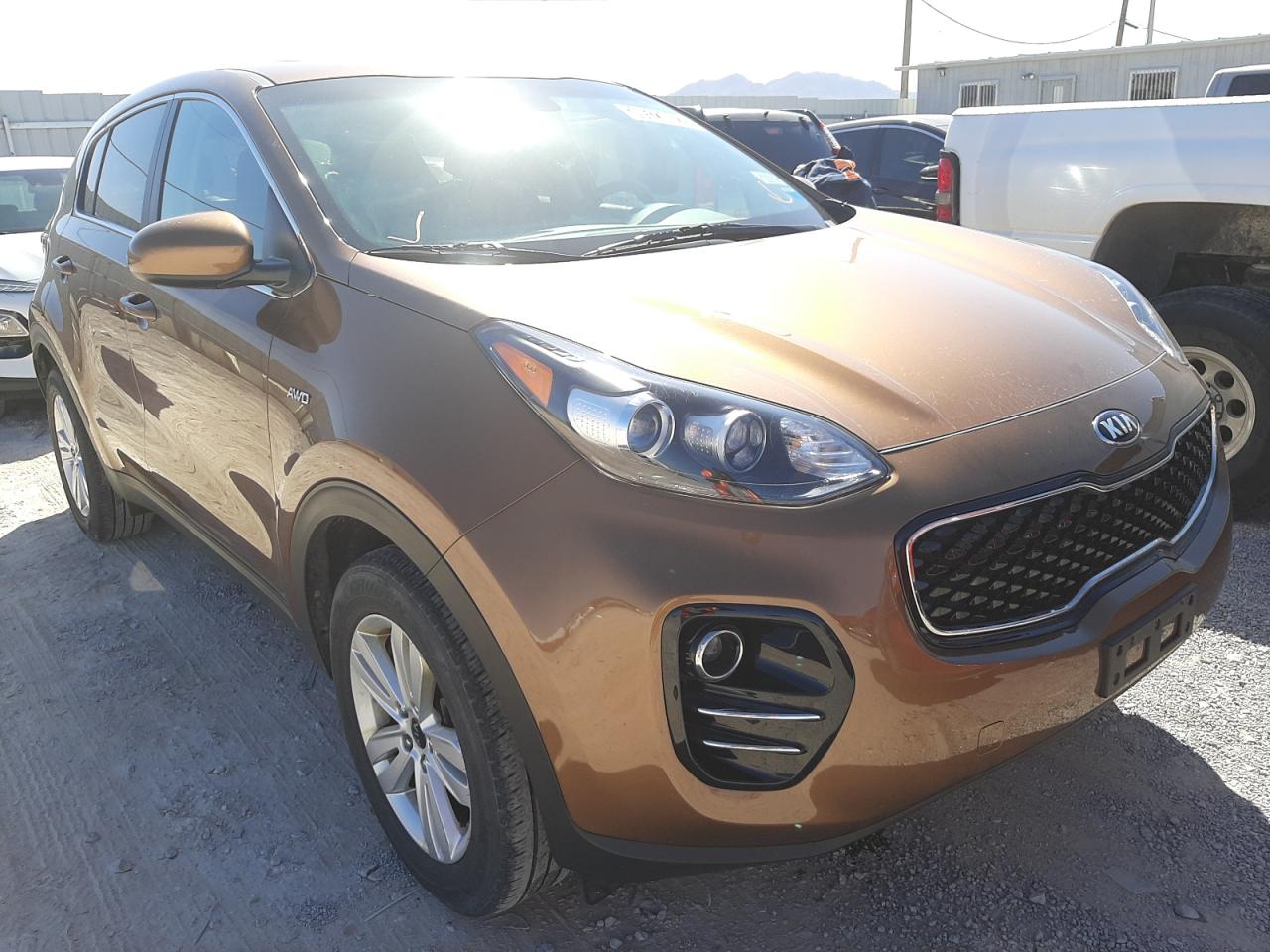 KIA SPORTAGE L 2018 with VIN KNDPMCAC0J7401845 - Photo from auction