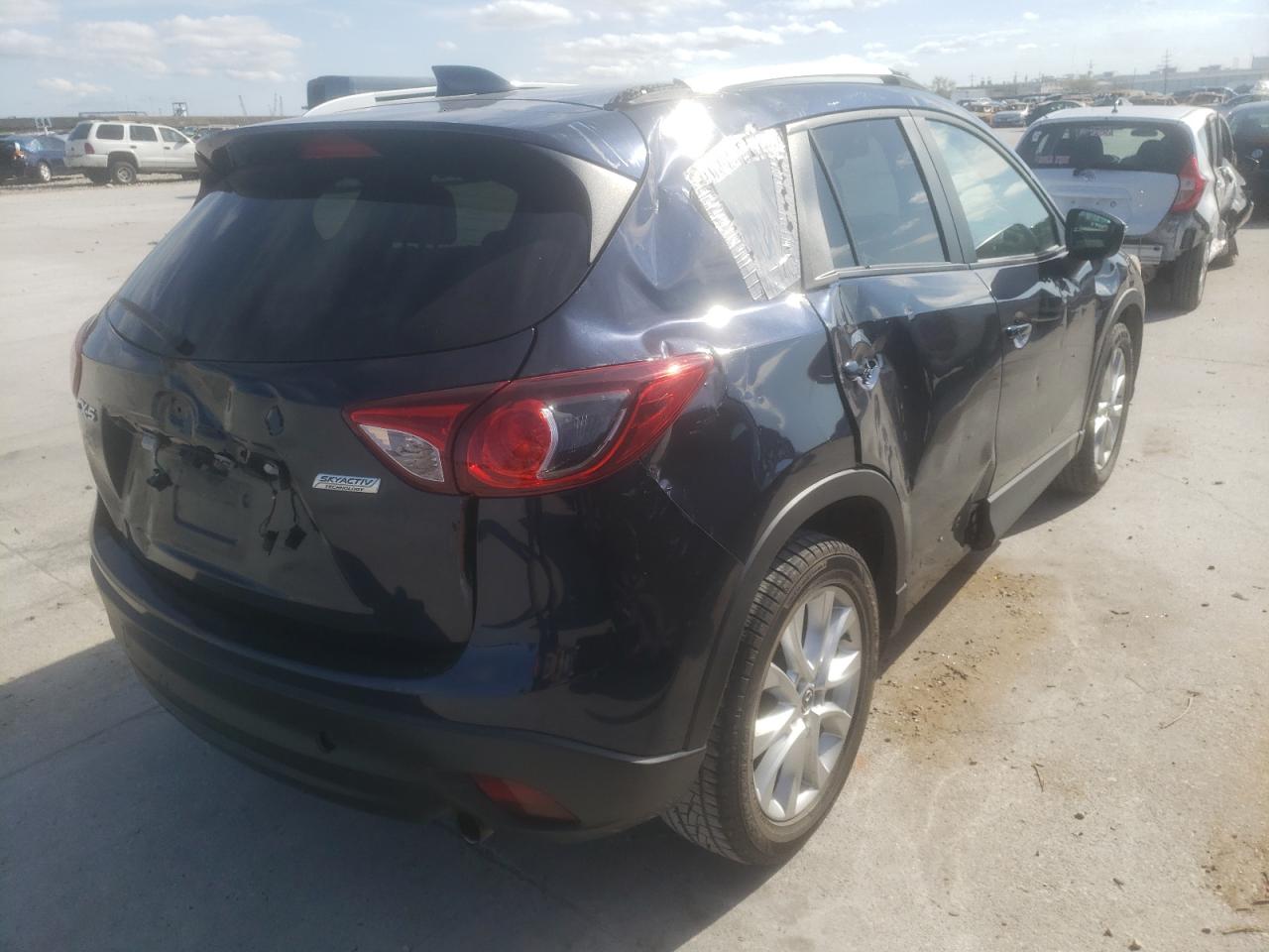 Photo 4 from auction – 2015 MAZDA CX-5 GT with VIN JM3KE2DY1F0527857