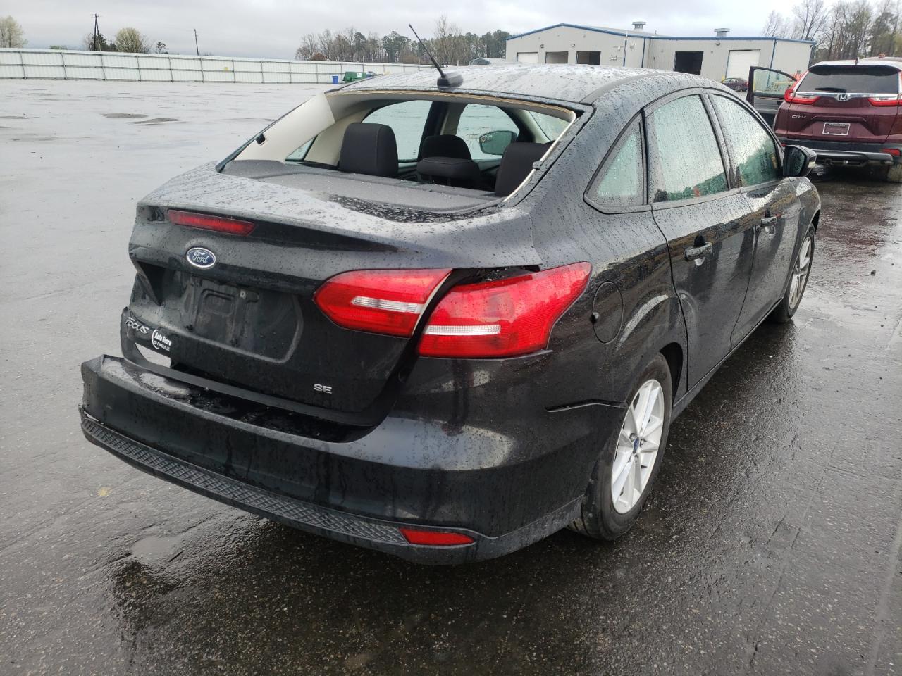 Photo 4 from auction – 2015 FORD FOCUS SE with VIN 1FADP3F25FL206564