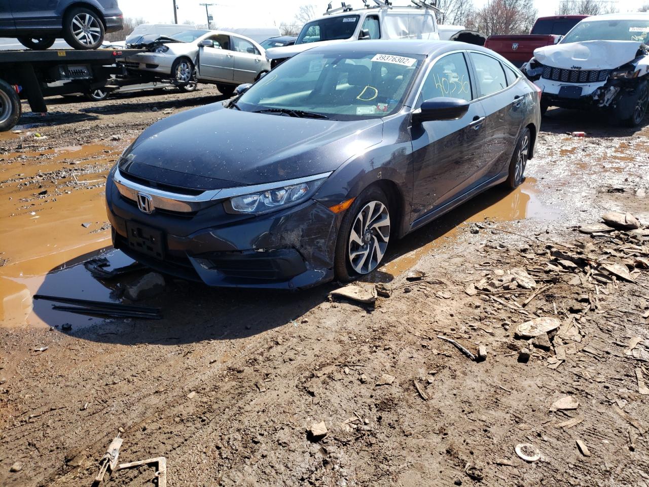 Photo 2 from auction – 2018 HONDA CIVIC EX with VIN 2HGFC2F71JH548668