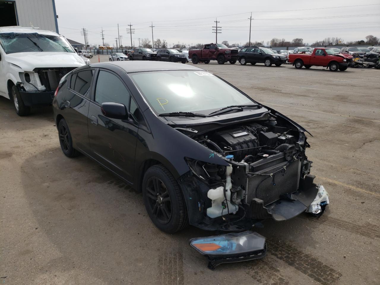 Photo 1 from auction – 2011 HONDA INSIGHT LX with VIN JHMZE2H5XBS004387
