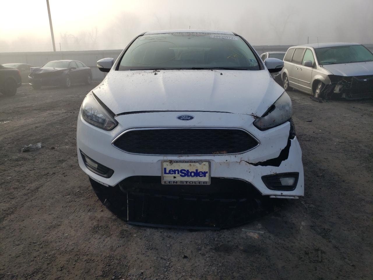 Photo 9 from auction – 2016 FORD FOCUS SE with VIN 1FADP3K25GL332527