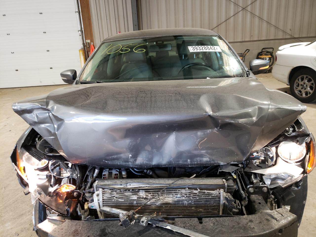 Photo 7 from auction – 2014 VOLKSWAGEN PASSAT S with VIN 1VWAT7A39EC021056