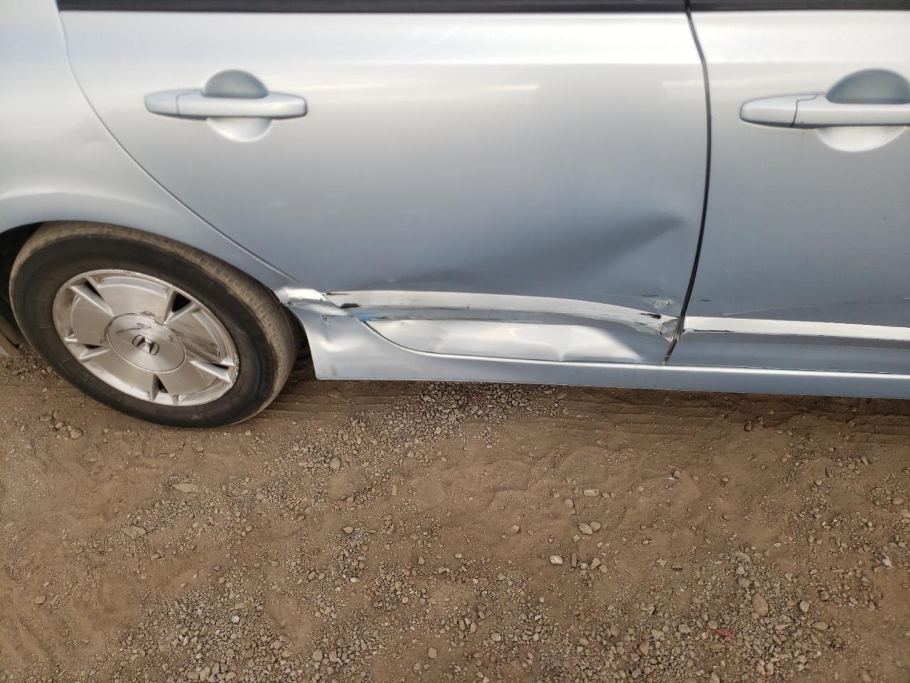 Photo 9 from auction – 2006 HONDA CIVIC HYBR with VIN JHMFA36296S003492