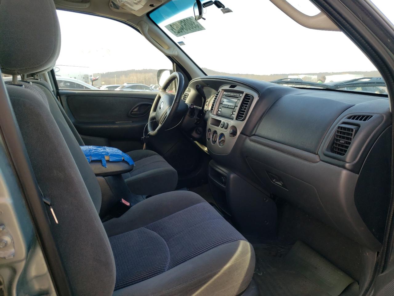 Photo 5 from auction – 2003 MAZDA TRIBUTE LX with VIN 4F2YZ04143KM37410