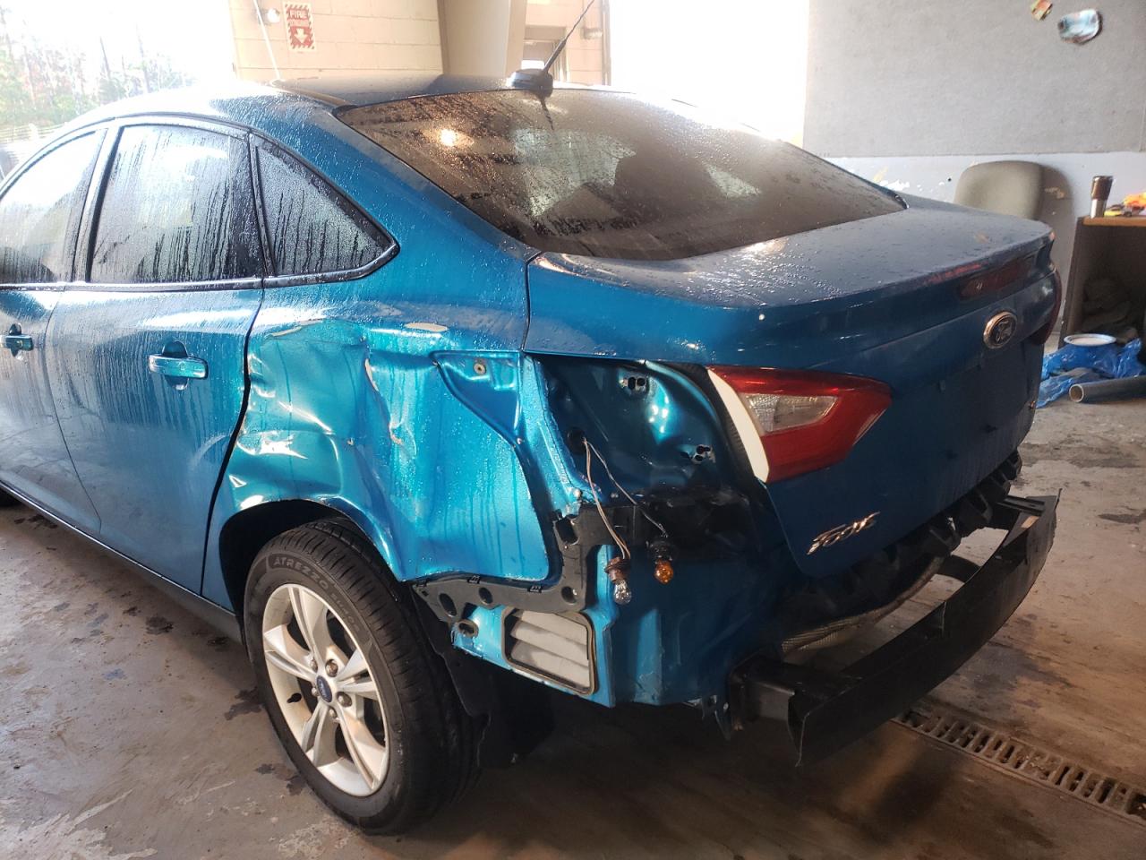 Photo 9 from auction – 2013 FORD FOCUS SE with VIN 1FADP3F29DL375936