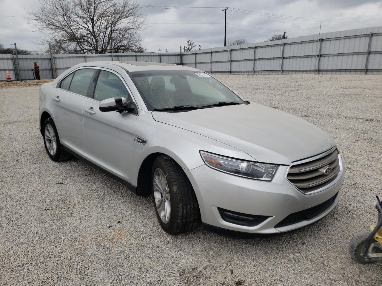 FORD TAURUS SEL 2014 with VIN 1FAHP2E80EG116991 - Photo from auction