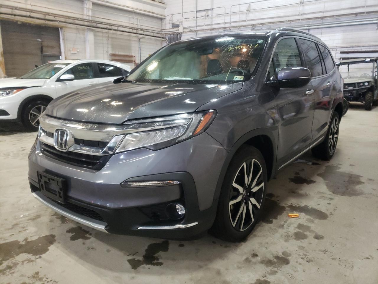 Photo 2 from auction – 2019 HONDA PILOT ELIT with VIN 5FNYF6H07KB048429
