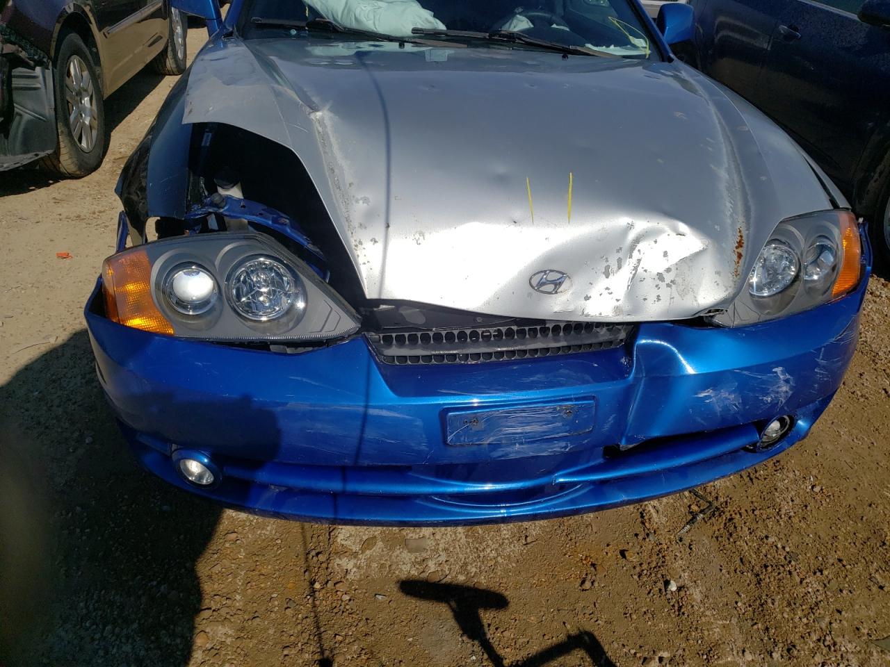 Photo 9 from auction – 2004 HYUNDAI TIBURON with VIN KMHHM65D94U152097