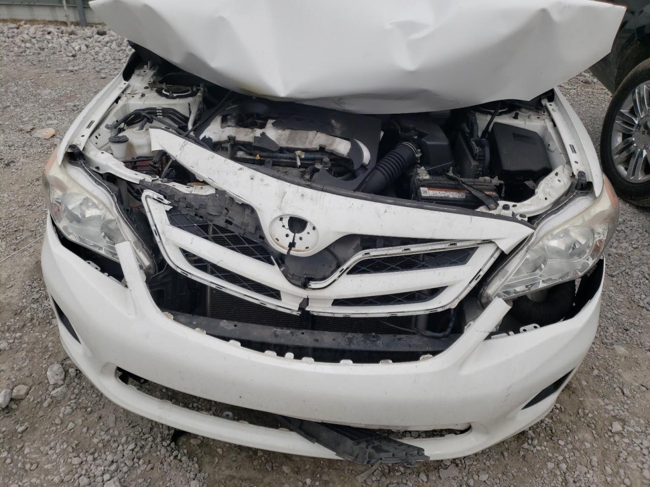 Photo 7 from auction – 2011 TOYOTA CAROLLA with VIN JTDBU4EE1B9128206