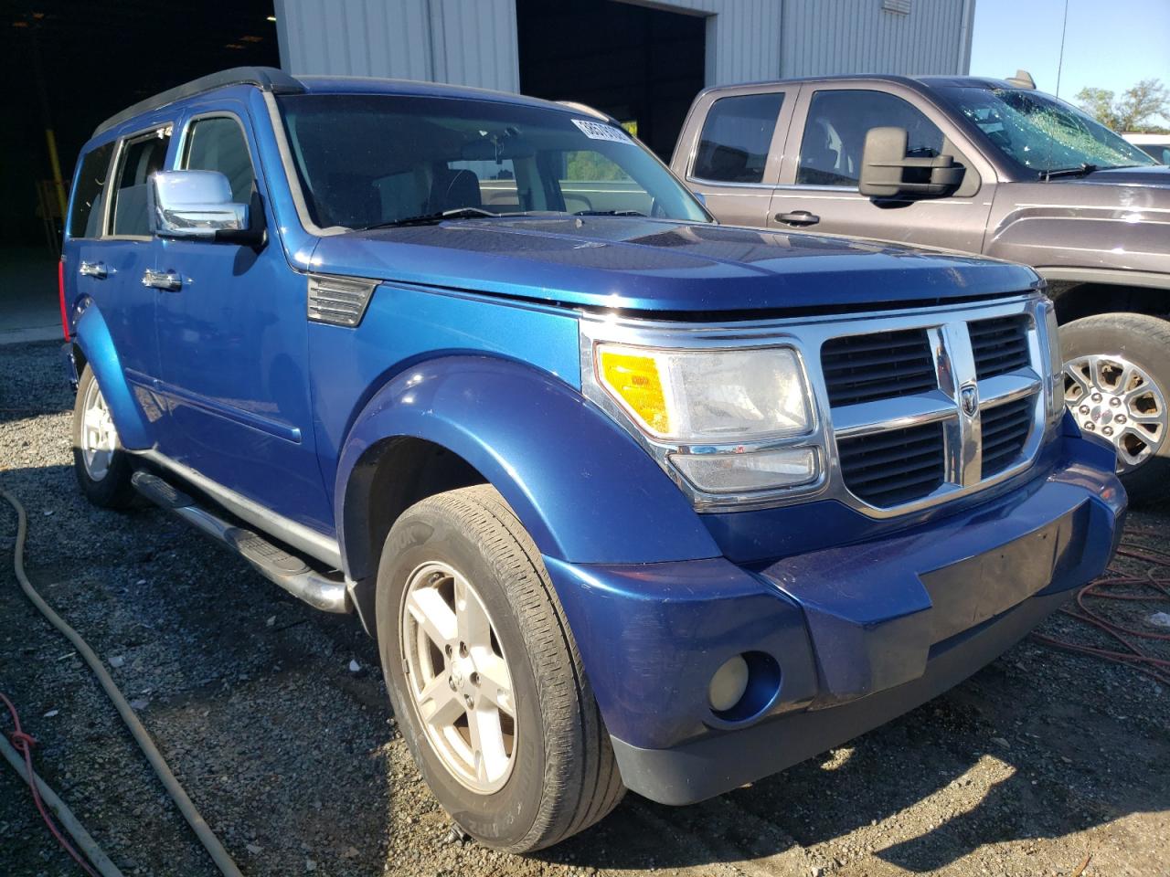 DODGE NITRO SE 2009 with VIN 1D8GU28K89W554466 - Photo from auction