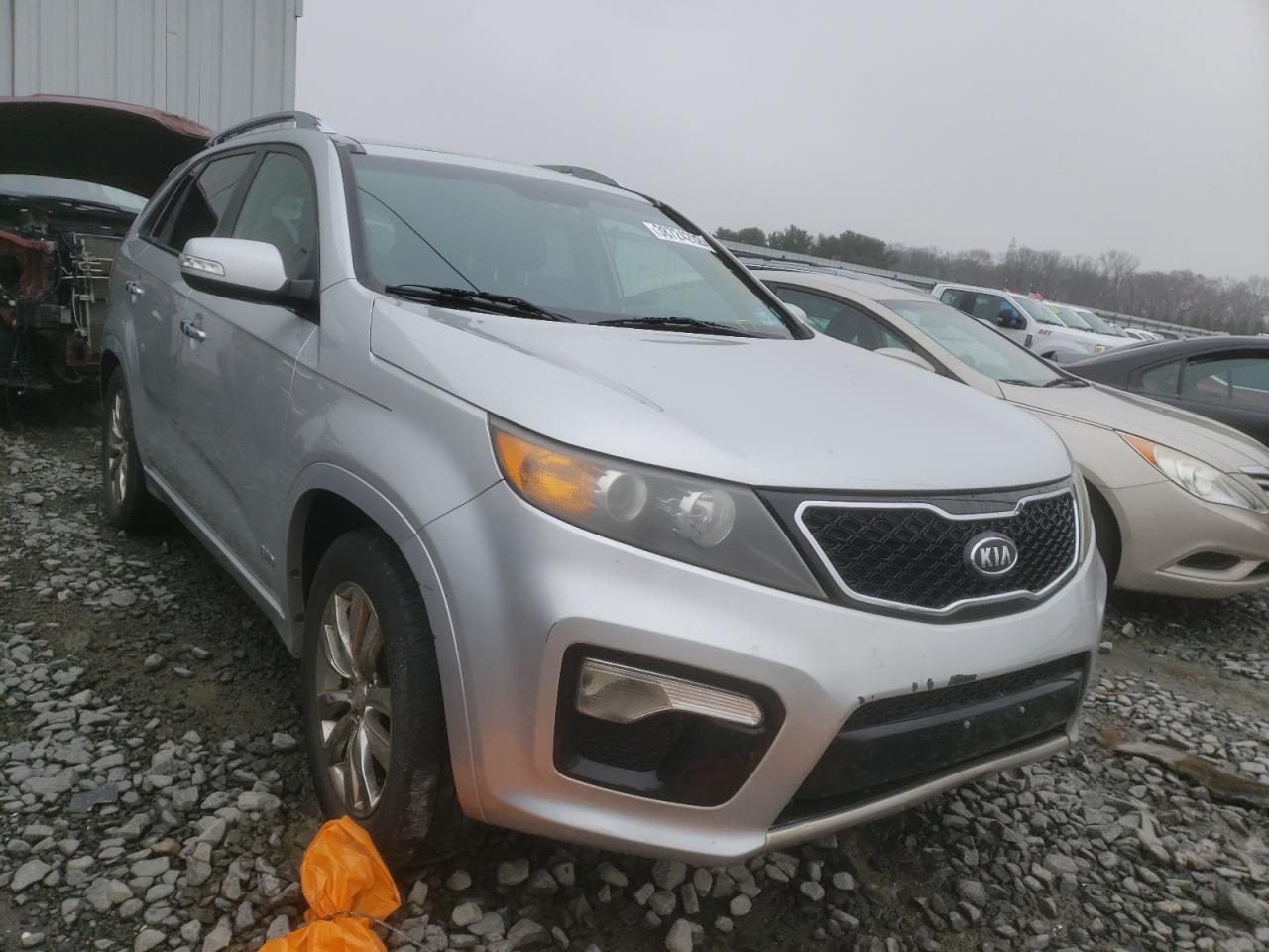 KIA SORENTO SX 2011 with VIN 5XYKWDA26BG100745 - Photo from auction
