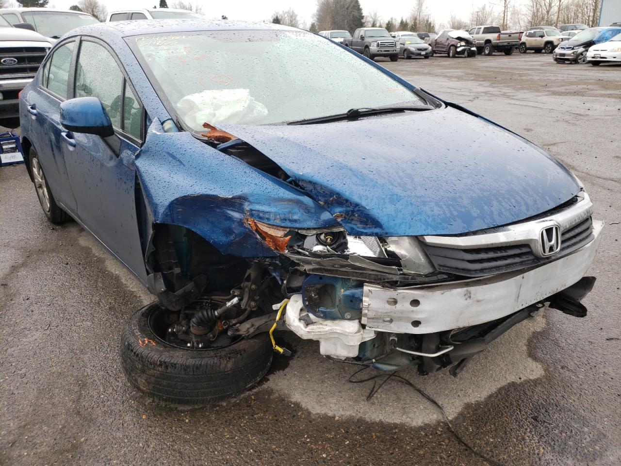 Photo 9 from auction – 2012 HONDA CIVIC LX with VIN 19XFB2F50CE369150