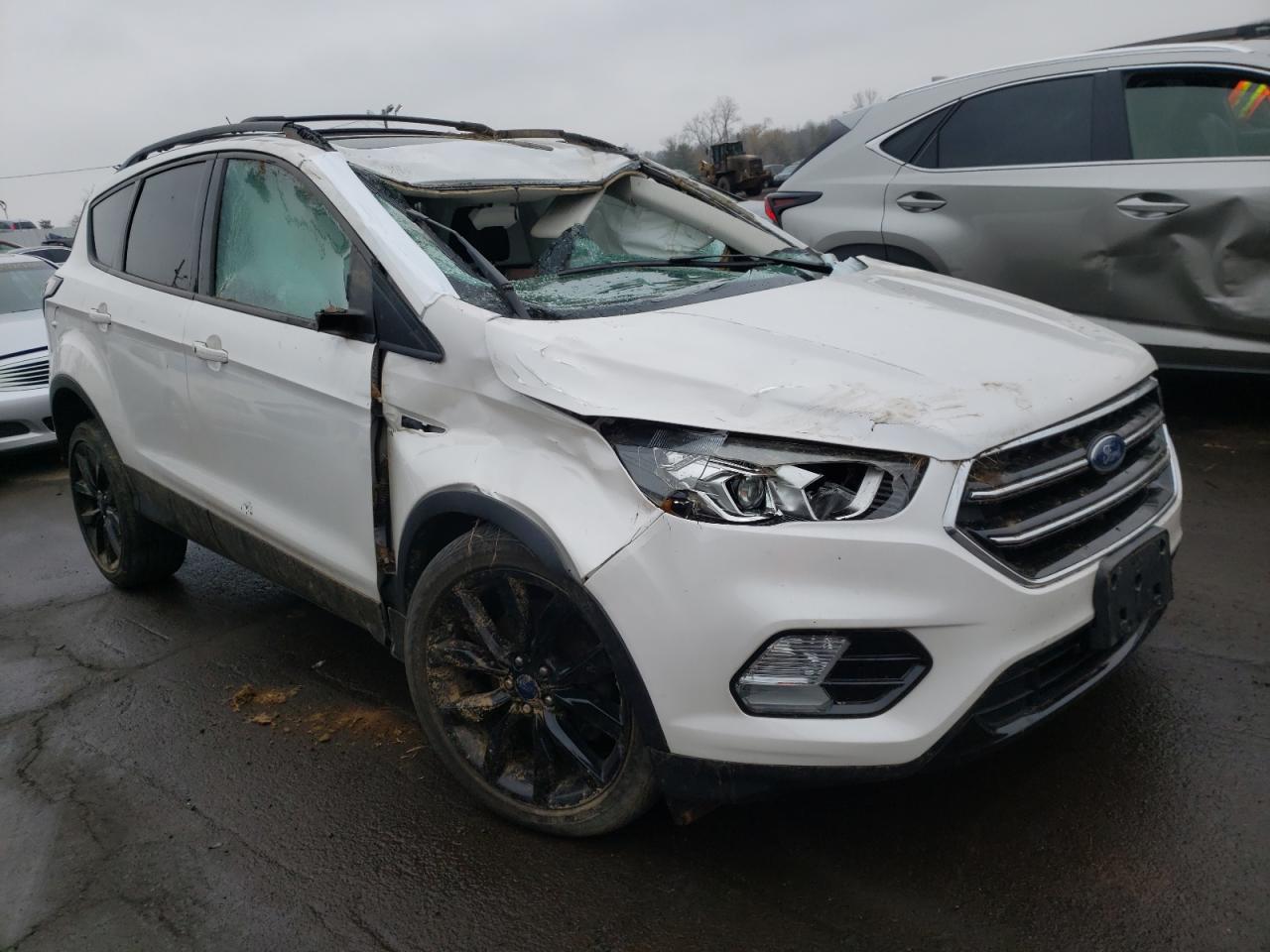 FORD ESCAPE TIT 2017 with VIN 1FMCU9JD0HUD47755 - Photo from auction