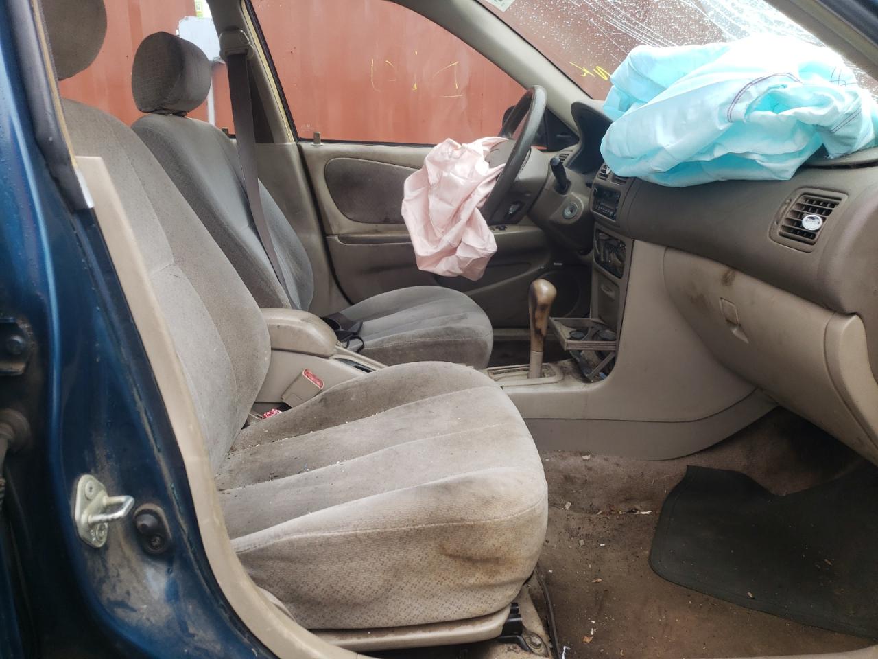 Photo 5 from auction – 1999 TOYOTA COROLLA VE with VIN 2T1BR12E7XC115837