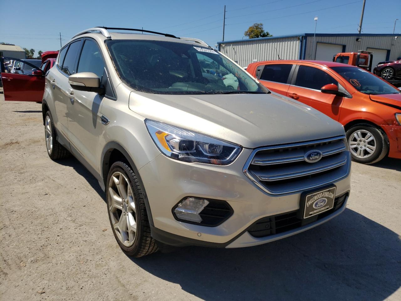 FORD ESCAPE TIT 2018 with VIN 1FMCU9J94JUD12332 - Photo from auction