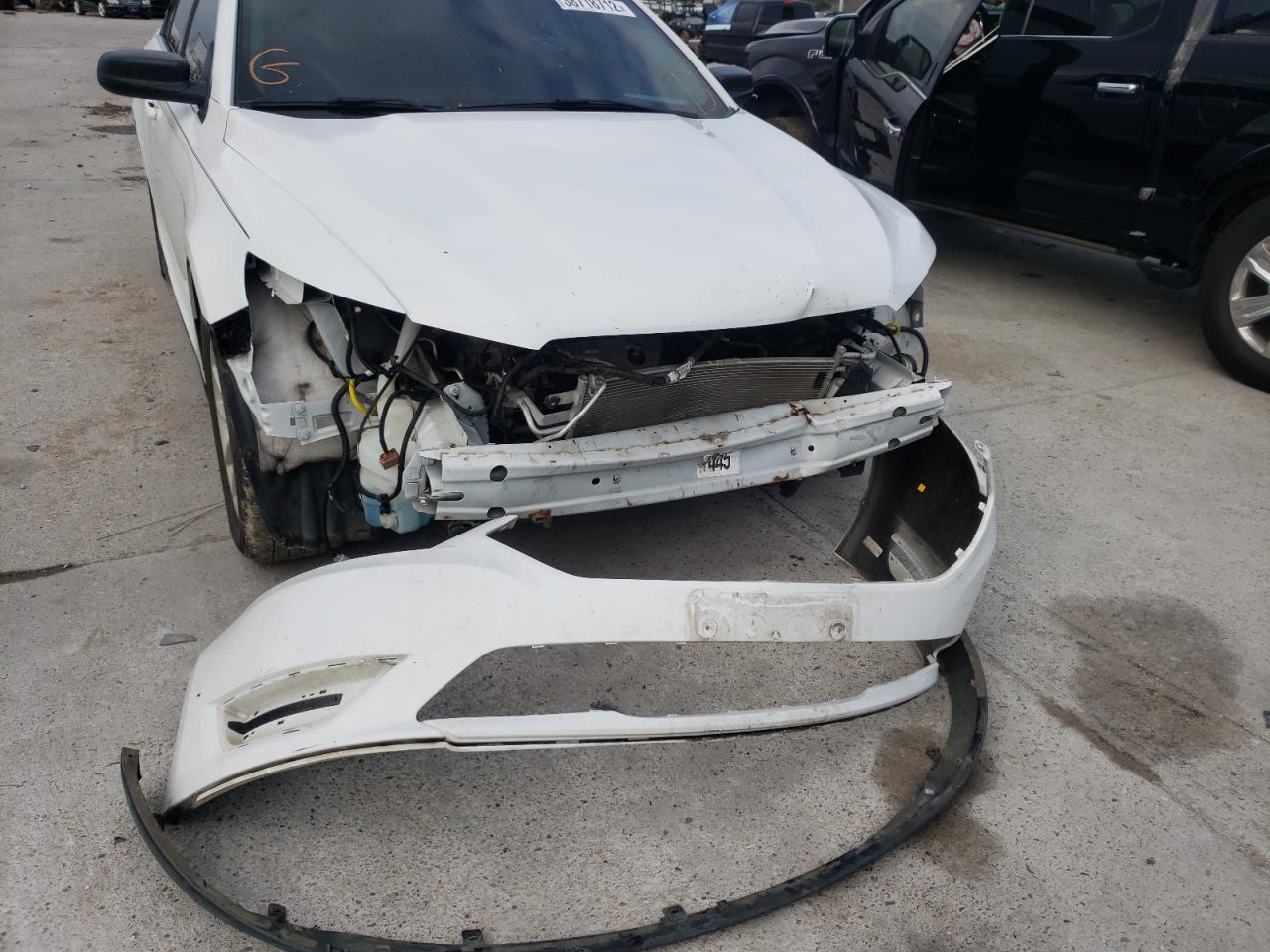 Photo 9 from auction – 2015 FORD TAURUS SE with VIN 1FAHP2D84FG107052