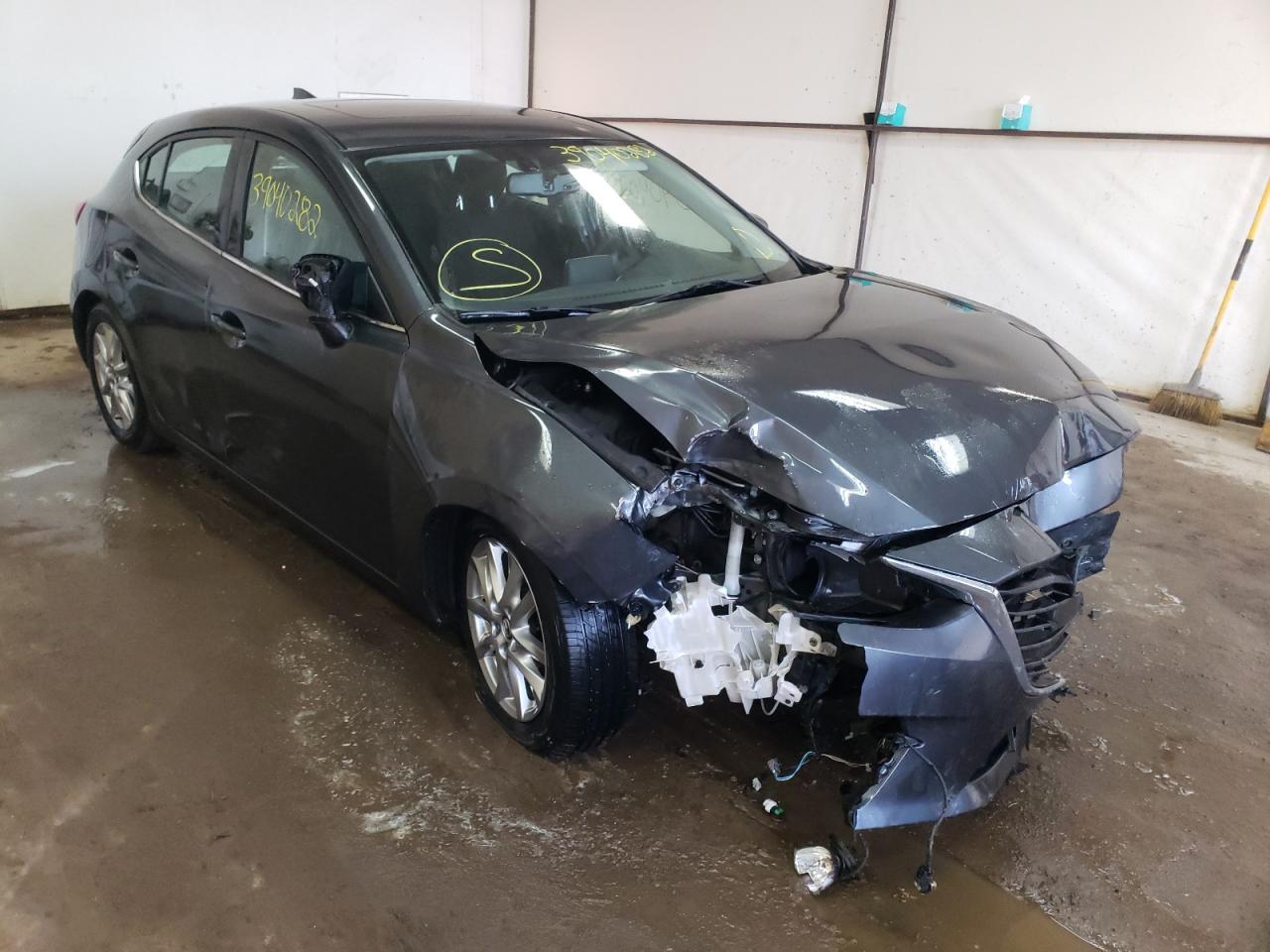 MAZDA 3 TOURING 2016 with VIN 3MZBM1M72GM320998 - Photo from auction