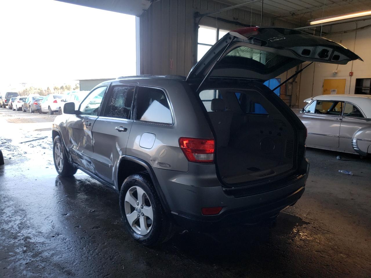 Photo 3 from auction – 2011 JEEP GRAND CHER with VIN 1J4RR4GG0BC577016