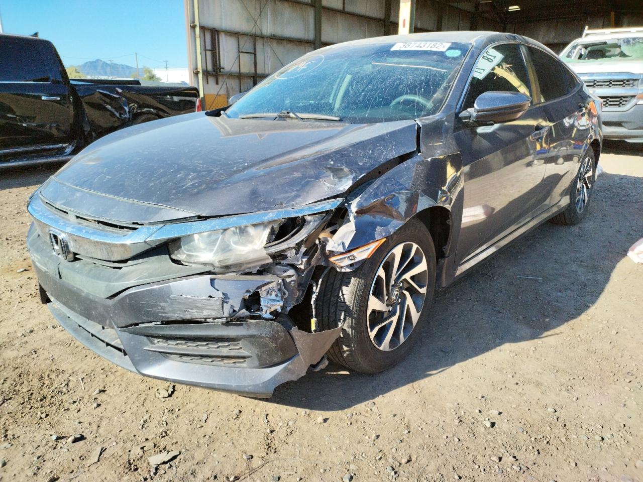 Photo 2 from auction – 2017 HONDA CIVIC EX with VIN 2HGFC2F73HH544339