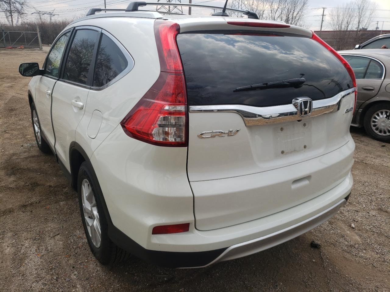 Photo 3 from auction – 2016 HONDA CR-V EXL with VIN 5J6RM4H70GL030736
