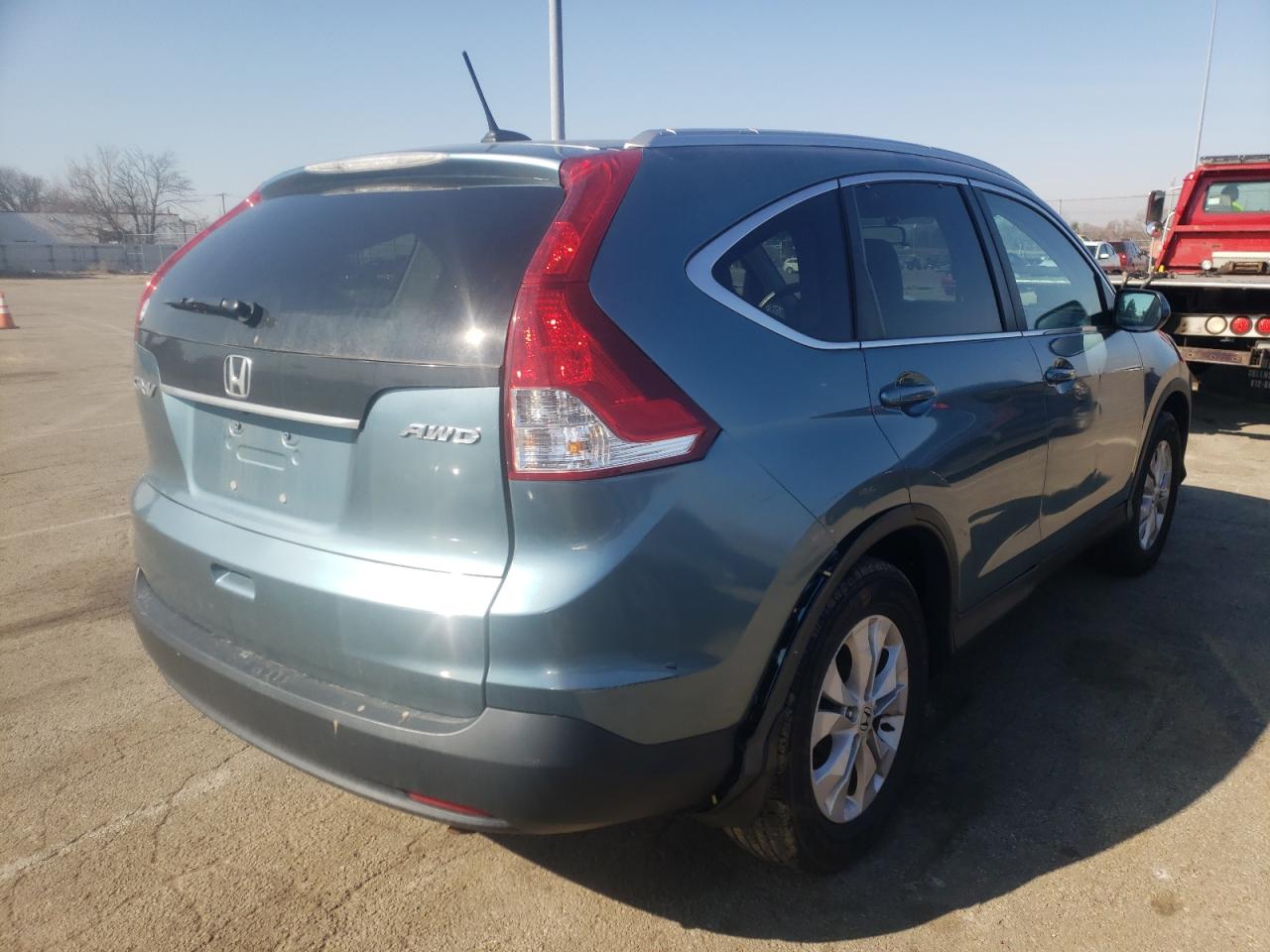 Photo 4 from auction – 2014 HONDA CR-V EXL with VIN 2HKRM4H70EH650879