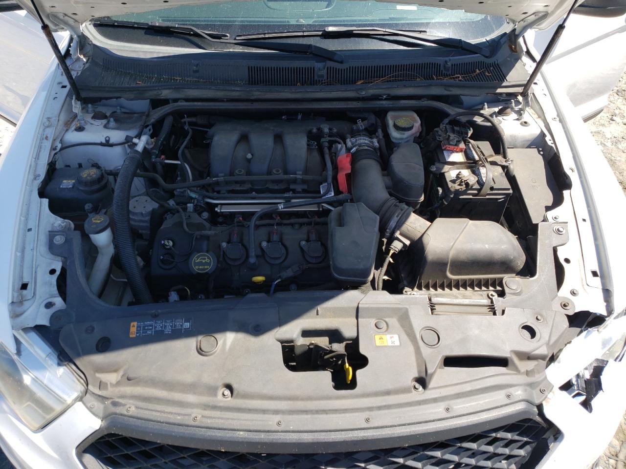 Photo 7 from auction – 2014 FORD TAURUS POL with VIN 1FAHP2L81EG159531