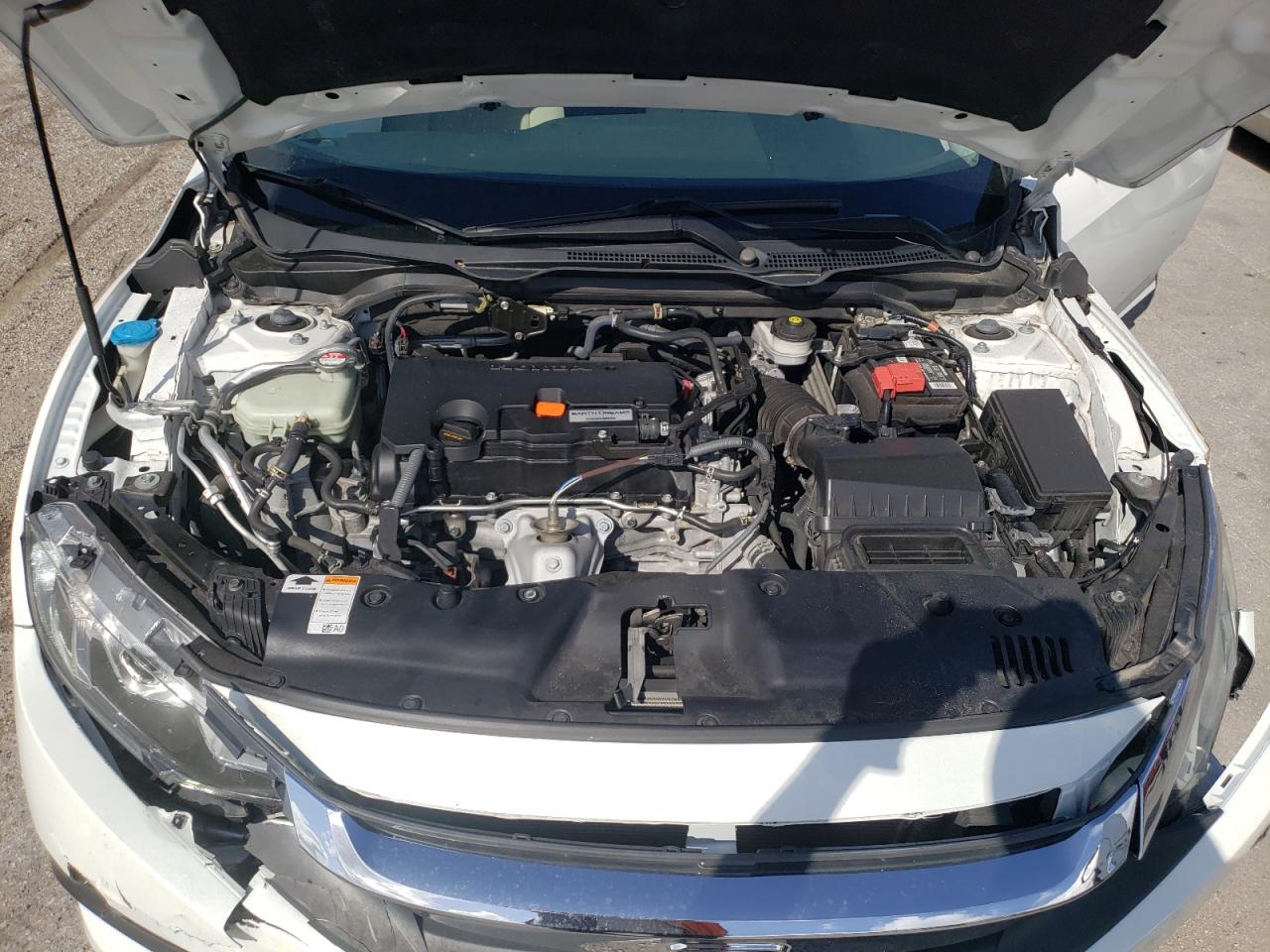 Photo 7 from auction – 2018 HONDA CIVIC EX with VIN 19XFC2F72JE041353