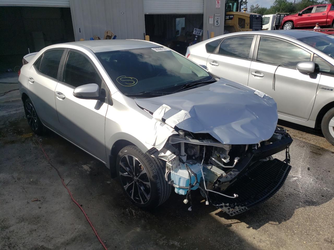 TOYOTA COROLLA L 2019 with VIN 5YFBURHE7KP874579 - Photo from auction