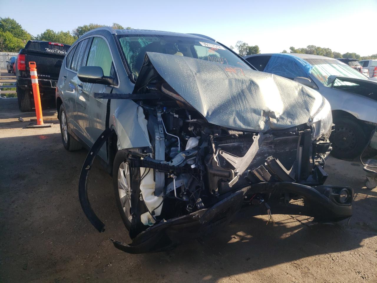 HONDA CR-V EXL 2012 with VIN JHLRM4H79CC010665 - Photo from auction
