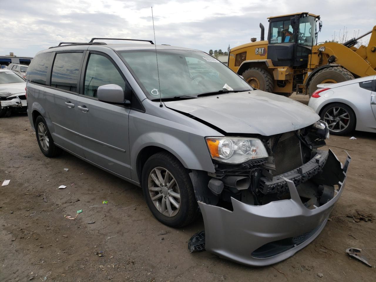 DODGE GRAND CARA 2015 with VIN 2C4RDGCG4FR591249 - Photo from auction
