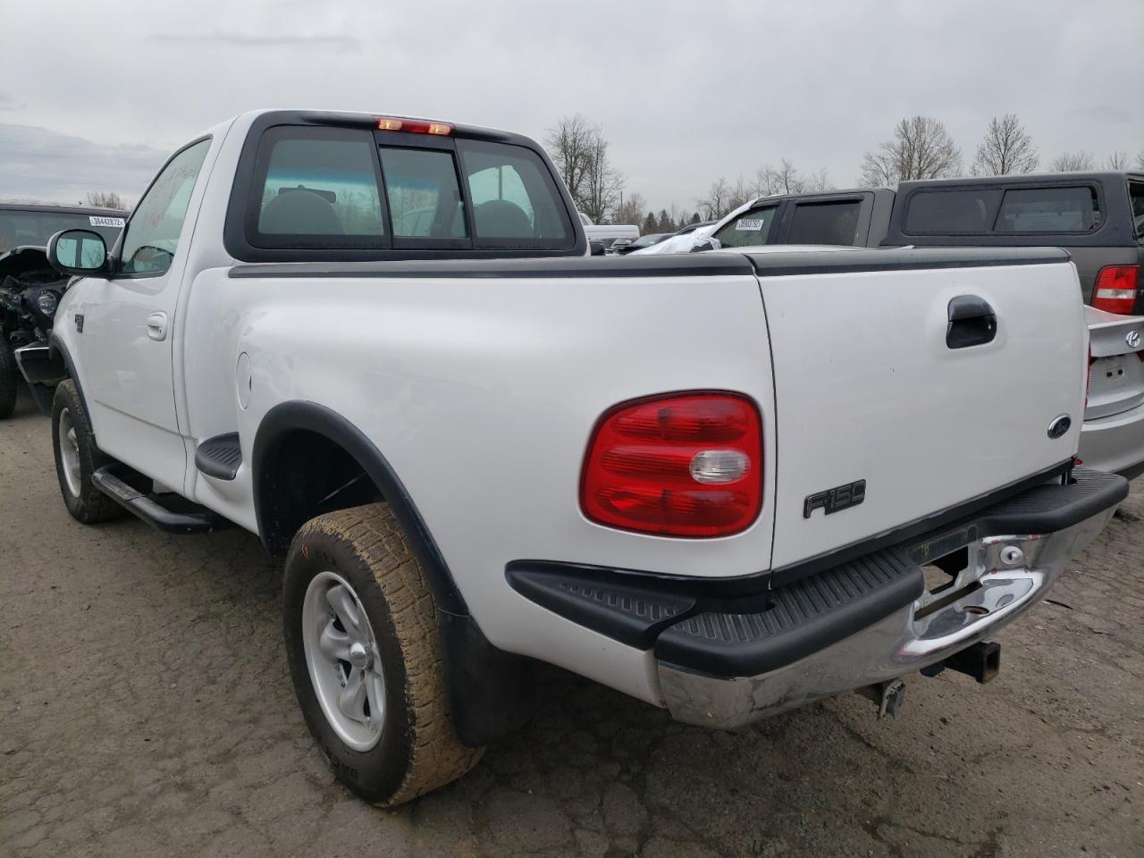 Photo 3 from auction – 1999 FORD F150 with VIN 2FTRF08L1XCA55872