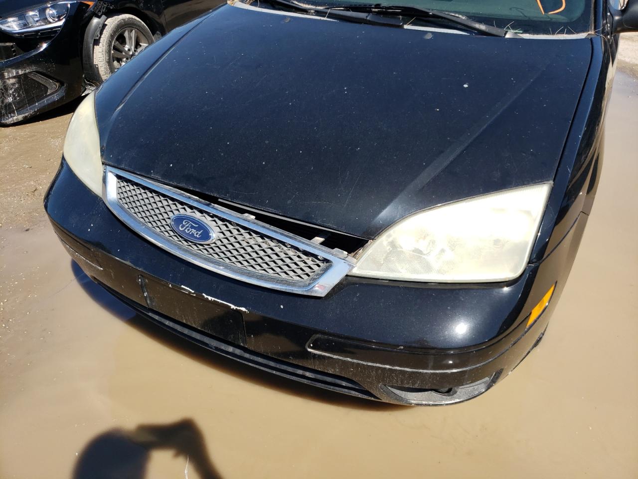 Photo 9 from auction – 2007 FORD FOCUS ZX3 with VIN 1FAFP31N77W348716
