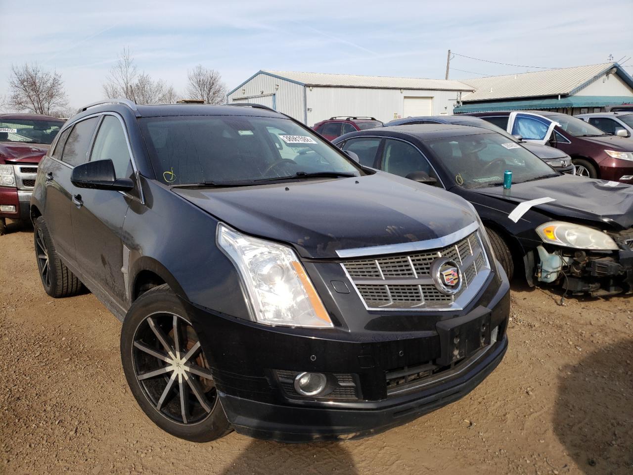 CADILLAC SRX 2010 with VIN 3GYFNEEY9AS625945 - Photo from auction
