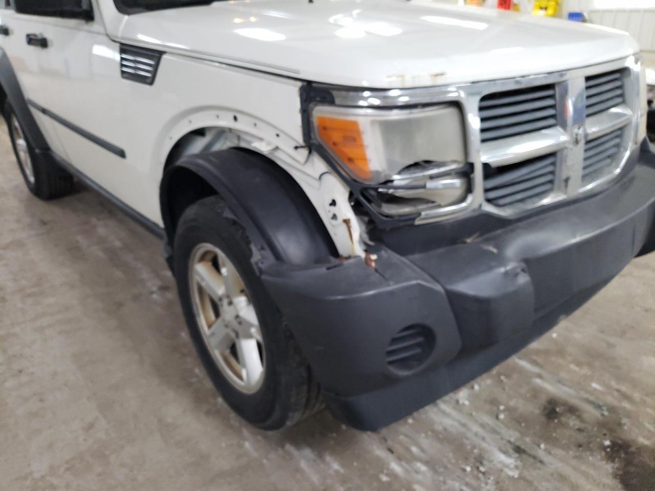 Photo 9 from auction – 2007 DODGE NITRO SXT with VIN 1D8GT28K97W740730