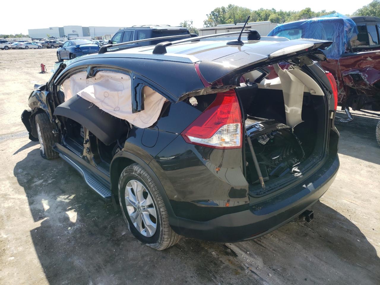 Photo 3 from auction – 2014 HONDA CR-V EXL with VIN 2HKRM4H74EH673355