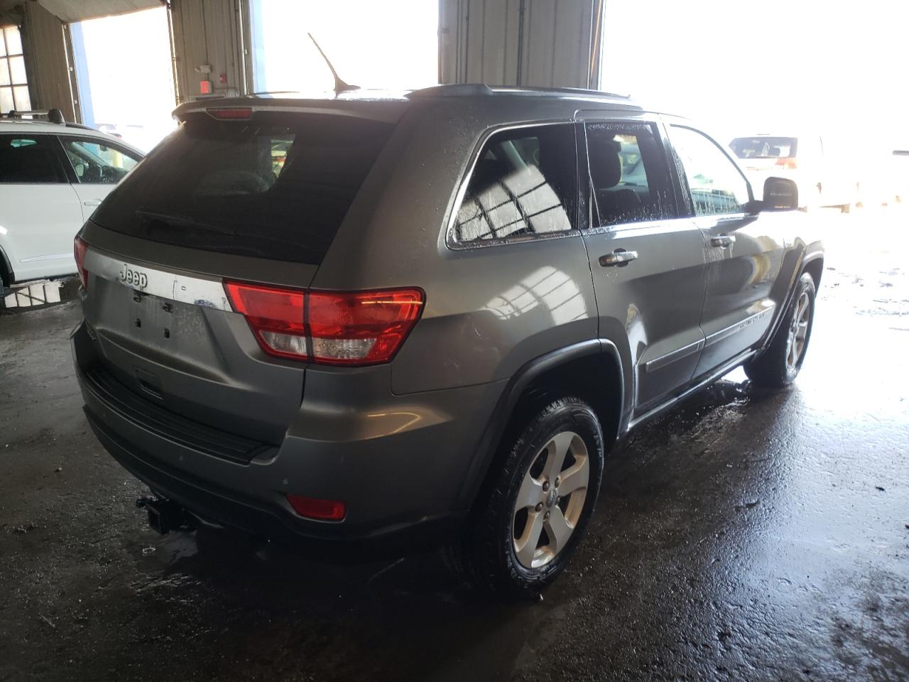 Photo 4 from auction – 2011 JEEP GRAND CHER with VIN 1J4RR4GG0BC577016
