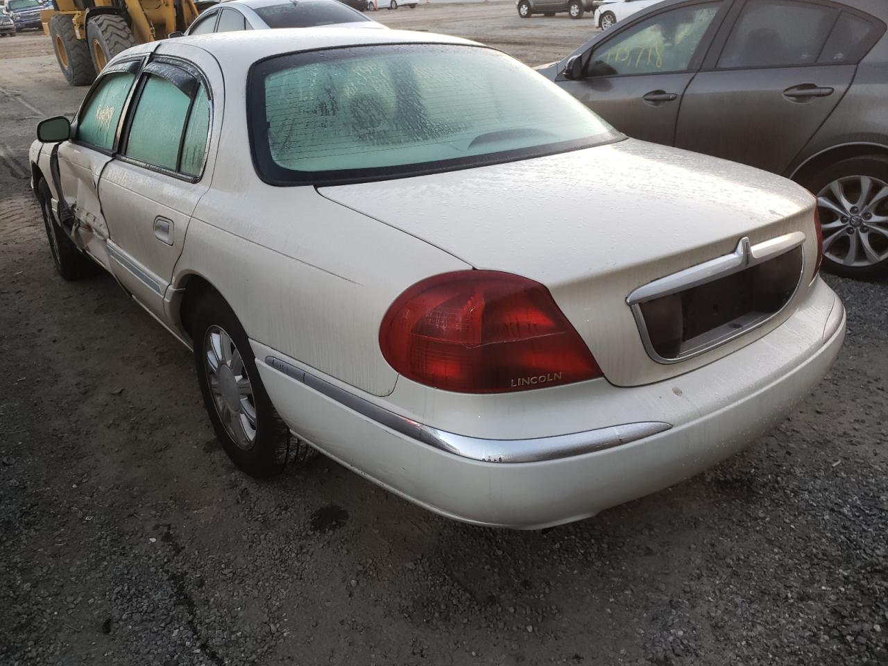 Photo 3 from auction – 2002 LINCOLN CONTINENTA with VIN 1LNHM97V42Y700035