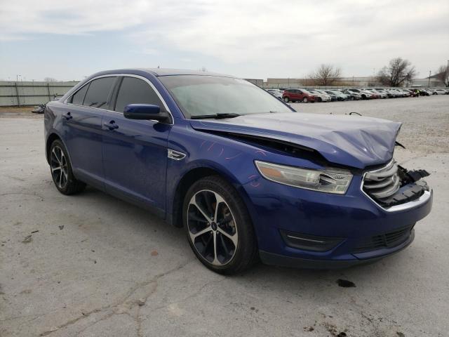 FORD TAURUS SEL 2014 with VIN 1FAHP2E85EG140770 - Photo from auction