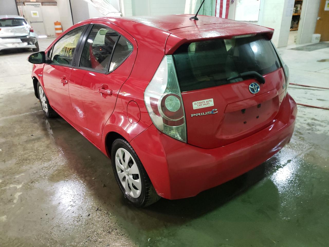 Photo 3 from auction – 2014 TOYOTA PRIUS C with VIN JTDKDTB36E1559785