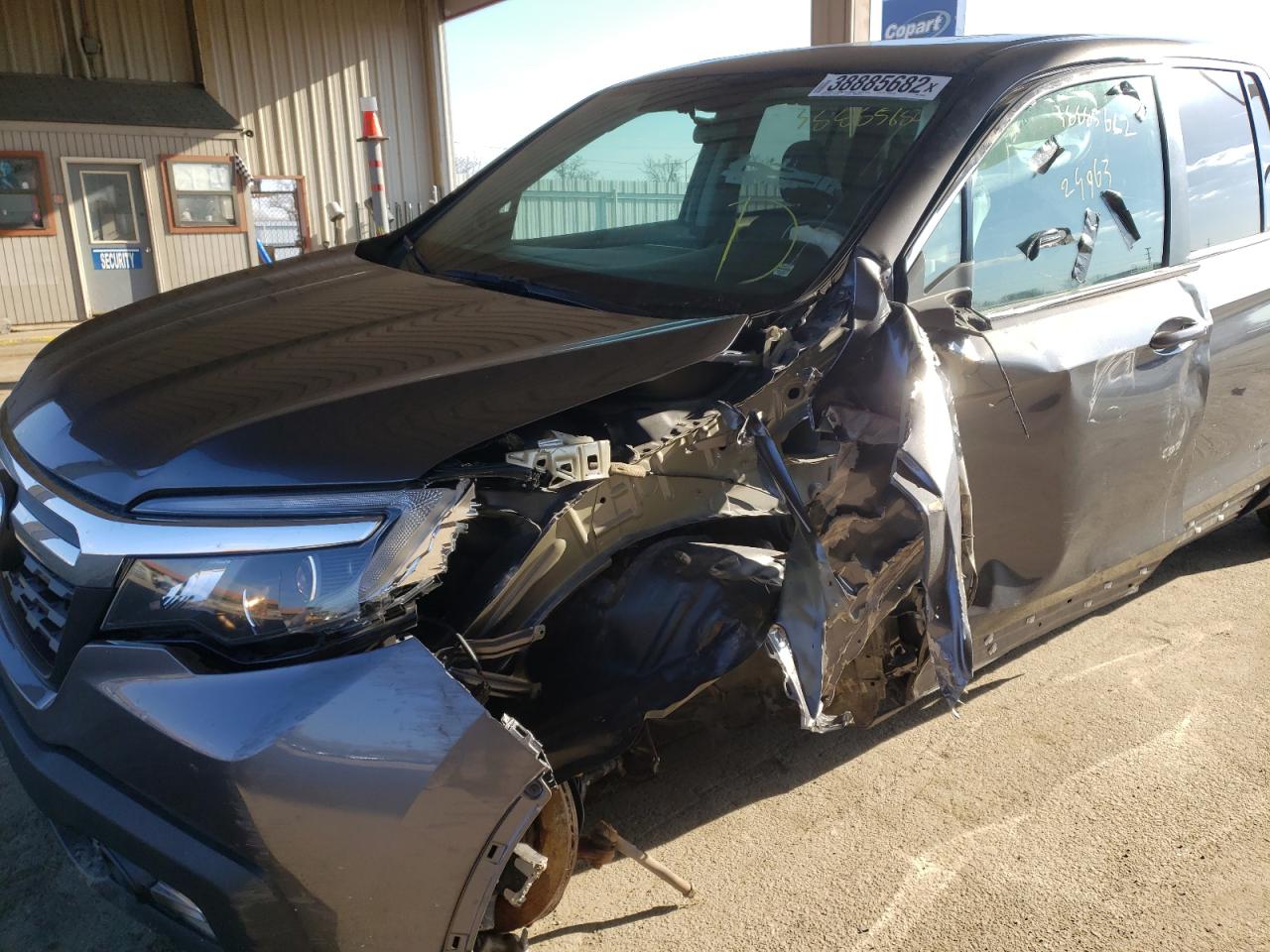 Photo 9 from auction – 2019 HONDA RIDGELINE with VIN 5FPYK3F57KB010389