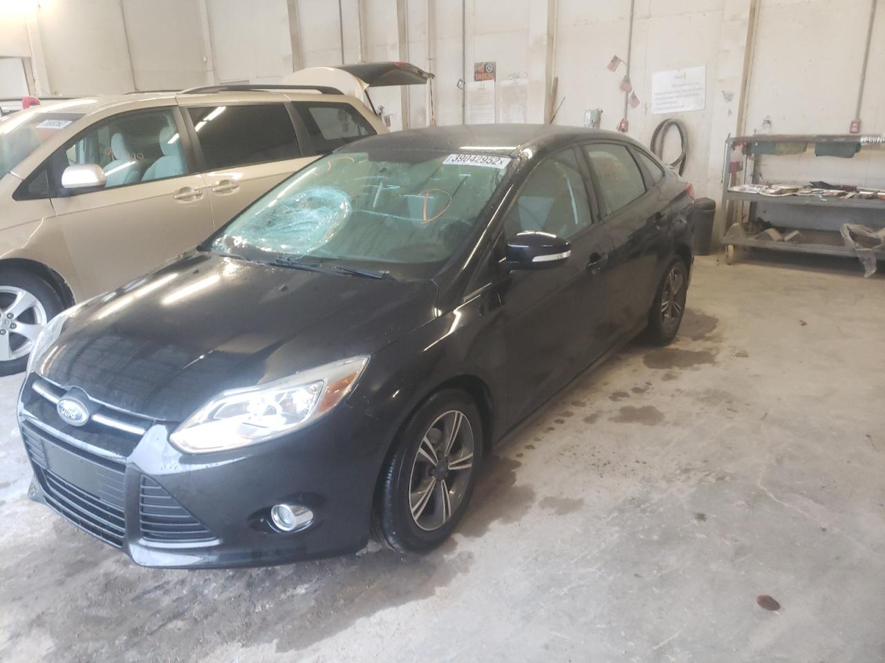 Foto 2 de la subasta – 2014 FORD FOCUS SE con VIN 1FADP3F21EL309253