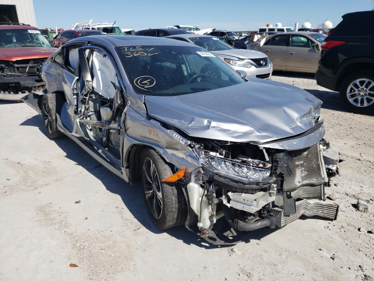 HONDA CIVIC TOUR 2016 with VIN 19XFC1F91GE033832 - Photo from auction