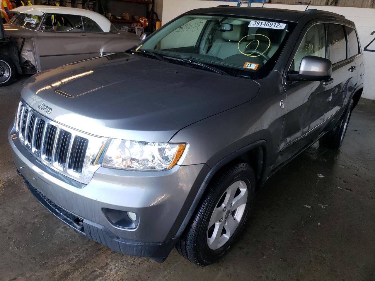 Photo 2 from auction – 2011 JEEP GRAND CHER with VIN 1J4RR4GG0BC577016
