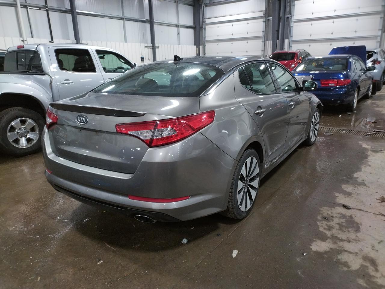 Photo 4 from auction – 2012 KIA OPTIMA SX with VIN 5XXGR4A61CG009467